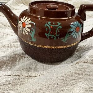 Vintage hand painted teapot made in England. Stoneware.